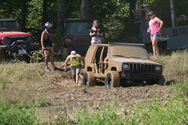 Trucks Gone Wild 2023 A -LI.jpg :: Four Wheel Drivinin' off roading at Brick's Off Road Park in Poplar Bluff, Missouri, USA. Trucks Gone Wild 2023 is one of the biggest events at the Off Road Park. The friendly park goers made sure I had a few great photographs before I left. Brad pulled up in his John Deere 4x4 that looked like it could get any vehicle un-stuck to see if everything was ok. I handed him a business card and assured him that all was well. I explained that I had been at the park with Brad Pitt and Matt Damon with my kids 20 years ago. We had fun then also I had another photo shut to get to that weekend and headed to Alton, Virginia, USA. Darren at Brick's Off Road Park in Poplar Bluff, Missouri, USA.  