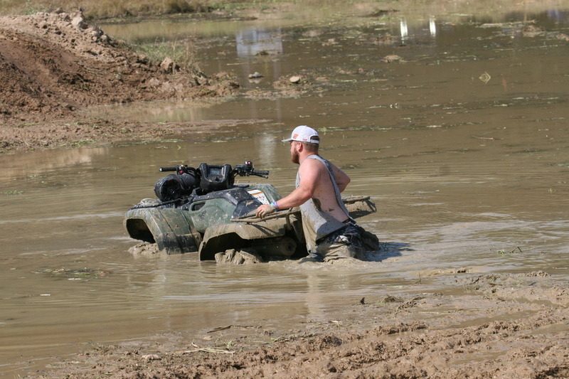 Trucks Gone Wild 2023 A -LII.jpg :: Four Wheel Drivinin' off roading at Brick's Off Road Park in Poplar Bluff, Missouri, USA. Trucks Gone Wild 2023 is one of the biggest events at the Off Road Park. The friendly park goers made sure I had a few great photographs before I left. Brad pulled up in his John Deere 4x4 that looked like it could get any vehicle un-stuck to see if everything was ok. I handed him a business card and assured him that all was well. I explained that I had been at the park with Brad Pitt and Matt Damon with my kids 20 years ago. We had fun then also I had another photo shut to get to that weekend and headed to Alton, Virginia, USA. Darren at Brick's Off Road Park in Poplar Bluff, Missouri, USA.  