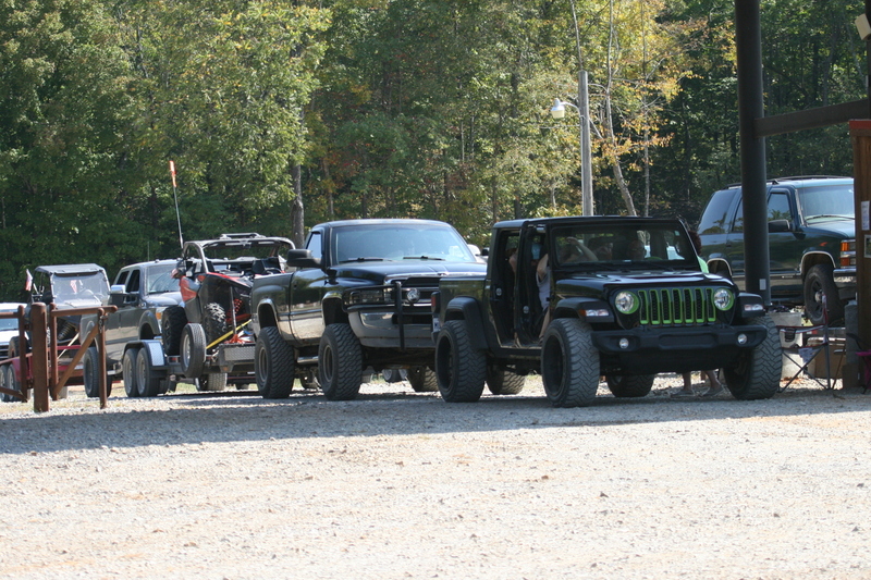Trucks Gone Wild 2023 A -LVIII.jpg :: Four Wheel Drivinin' off roading at Brick's Off Road Park in Poplar Bluff, Missouri, USA. Trucks Gone Wild 2023 is one of the biggest events at the Off Road Park. The friendly park goers made sure I had a few great photographs before I left. Brad pulled up in his John Deere 4x4 that looked like it could get any vehicle un-stuck to see if everything was ok. I handed him a business card and assured him that all was well. I explained that I had been at the park with Brad Pitt and Matt Damon with my kids 20 years ago. We had fun then also I had another photo shut to get to that weekend and headed to Alton, Virginia, USA. Darren at Brick's Off Road Park in Poplar Bluff, Missouri, USA.  