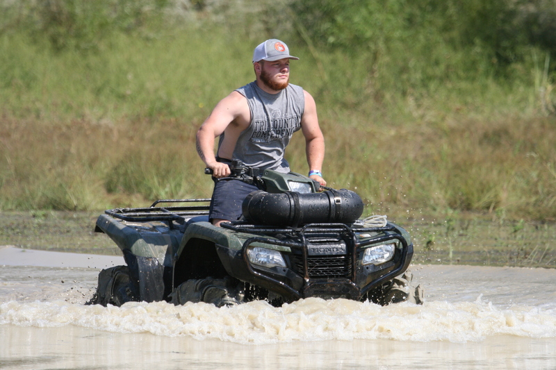 Trucks Gone Wild 2023 A -XXX.jpg :: Four Wheel Drivinin' off roading at Brick's Off Road Park in Poplar Bluff, Missouri, USA. Trucks Gone Wild 2023 is one of the biggest events at the Off Road Park. The friendly park goers made sure I had a few great photographs before I left. Brad pulled up in his John Deere 4x4 that looked like it could get any vehicle un-stuck to see if everything was ok. I handed him a business card and assured him that all was well. I explained that I had been at the park with Brad Pitt and Matt Damon with my kids 20 years ago. We had fun then also I had another photo shut to get to that weekend and headed to Alton, Virginia, USA. Darren at Brick's Off Road Park in Poplar Bluff, Missouri, USA.  