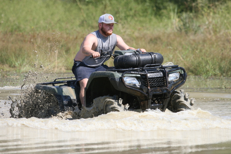 Trucks Gone Wild 2023 A -XXXI.jpg :: Four Wheel Drivinin' off roading at Brick's Off Road Park in Poplar Bluff, Missouri, USA. Trucks Gone Wild 2023 is one of the biggest events at the Off Road Park. The friendly park goers made sure I had a few great photographs before I left. Brad pulled up in his John Deere 4x4 that looked like it could get any vehicle un-stuck to see if everything was ok. I handed him a business card and assured him that all was well. I explained that I had been at the park with Brad Pitt and Matt Damon with my kids 20 years ago. We had fun then also I had another photo shut to get to that weekend and headed to Alton, Virginia, USA. Darren at Brick's Off Road Park in Poplar Bluff, Missouri, USA.  