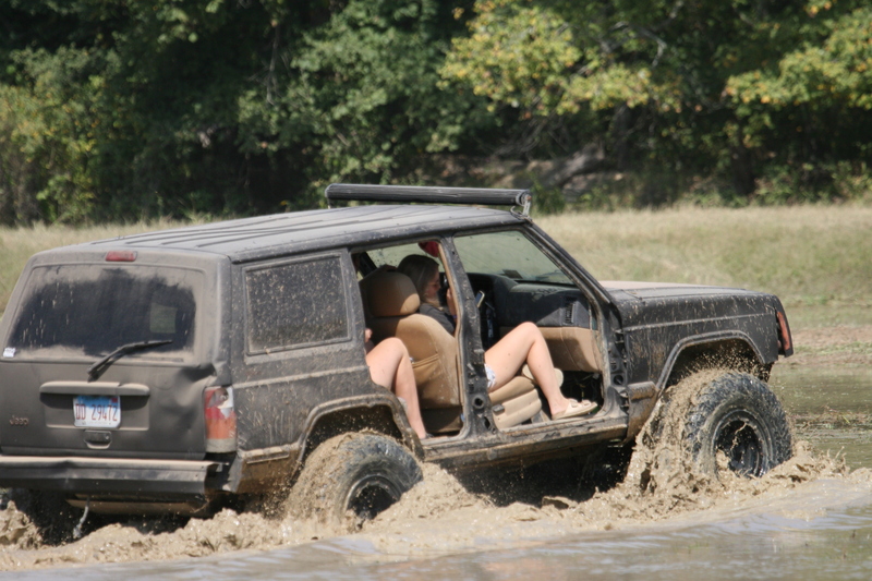 Trucks Gone Wild 2023 A -XXXIII.jpg :: Four Wheel Drivinin' off roading at Brick's Off Road Park in Poplar Bluff, Missouri, USA. Trucks Gone Wild 2023 is one of the biggest events at the Off Road Park. The friendly park goers made sure I had a few great photographs before I left. Brad pulled up in his John Deere 4x4 that looked like it could get any vehicle un-stuck to see if everything was ok. I handed him a business card and assured him that all was well. I explained that I had been at the park with Brad Pitt and Matt Damon with my kids 20 years ago. We had fun then also I had another photo shut to get to that weekend and headed to Alton, Virginia, USA. Darren at Brick's Off Road Park in Poplar Bluff, Missouri, USA.  