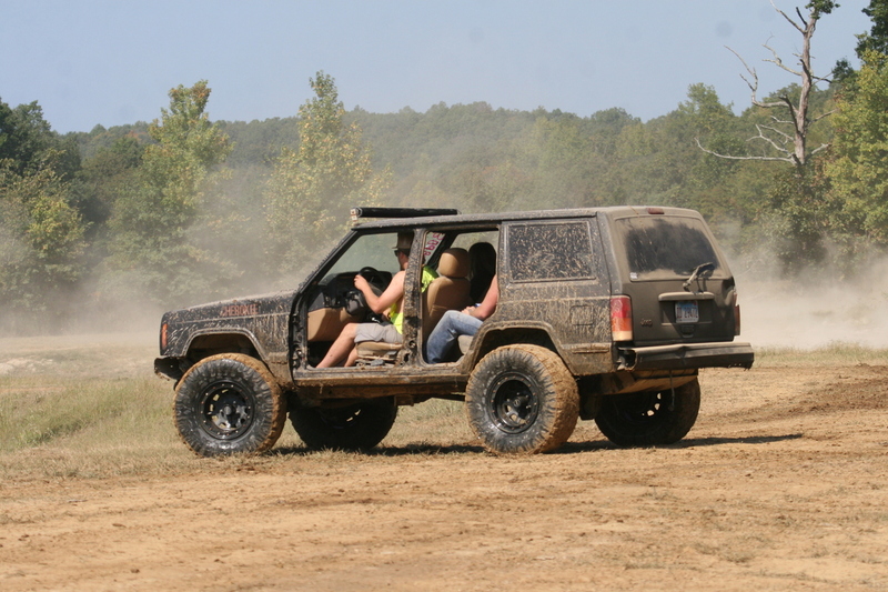 Trucks Gone Wild 2023 A -XXXVII.jpg :: Four Wheel Drivinin' off roading at Brick's Off Road Park in Poplar Bluff, Missouri, USA. Trucks Gone Wild 2023 is one of the biggest events at the Off Road Park. The friendly park goers made sure I had a few great photographs before I left. Brad pulled up in his John Deere 4x4 that looked like it could get any vehicle un-stuck to see if everything was ok. I handed him a business card and assured him that all was well. I explained that I had been at the park with Brad Pitt and Matt Damon with my kids 20 years ago. We had fun then also I had another photo shut to get to that weekend and headed to Alton, Virginia, USA. Darren at Brick's Off Road Park in Poplar Bluff, Missouri, USA.  