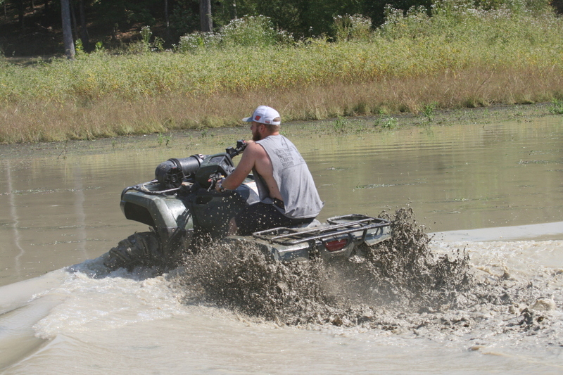 Trucks Gone Wild 2023 A -XXXXI.jpg :: Four Wheel Drivinin' off roading at Brick's Off Road Park in Poplar Bluff, Missouri, USA. Trucks Gone Wild 2023 is one of the biggest events at the Off Road Park. The friendly park goers made sure I had a few great photographs before I left. Brad pulled up in his John Deere 4x4 that looked like it could get any vehicle un-stuck to see if everything was ok. I handed him a business card and assured him that all was well. I explained that I had been at the park with Brad Pitt and Matt Damon with my kids 20 years ago. We had fun then also I had another photo shut to get to that weekend and headed to Alton, Virginia, USA. Darren at Brick's Off Road Park in Poplar Bluff, Missouri, USA.  
