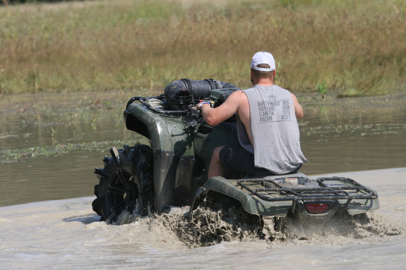 Trucks Gone Wild 2023 A -XXXXII.jpg :: Four Wheel Drivinin' off roading at Brick's Off Road Park in Poplar Bluff, Missouri, USA. Trucks Gone Wild 2023 is one of the biggest events at the Off Road Park. The friendly park goers made sure I had a few great photographs before I left. Brad pulled up in his John Deere 4x4 that looked like it could get any vehicle un-stuck to see if everything was ok. I handed him a business card and assured him that all was well. I explained that I had been at the park with Brad Pitt and Matt Damon with my kids 20 years ago. We had fun then also I had another photo shut to get to that weekend and headed to Alton, Virginia, USA. Darren at Brick's Off Road Park in Poplar Bluff, Missouri, USA.  
