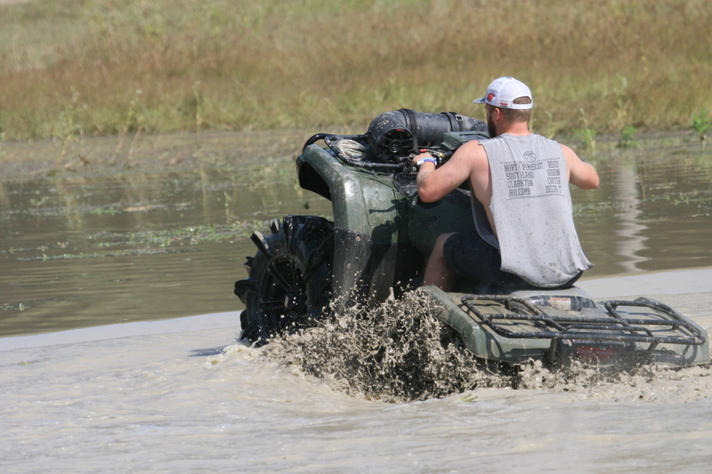 Trucks Gone Wild 2023 A -XXXXIII.jpg :: Four Wheel Drivinin' off roading at Brick's Off Road Park in Poplar Bluff, Missouri, USA. Trucks Gone Wild 2023 is one of the biggest events at the Off Road Park. The friendly park goers made sure I had a few great photographs before I left. Brad pulled up in his John Deere 4x4 that looked like it could get any vehicle un-stuck to see if everything was ok. I handed him a business card and assured him that all was well. I explained that I had been at the park with Brad Pitt and Matt Damon with my kids 20 years ago. We had fun then also I had another photo shut to get to that weekend and headed to Alton, Virginia, USA. Darren at Brick's Off Road Park in Poplar Bluff, Missouri, USA.  