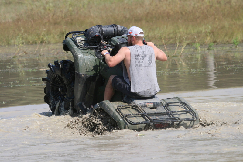 Trucks Gone Wild 2023 A -XXXXIV.jpg :: Four Wheel Drivinin' off roading at Brick's Off Road Park in Poplar Bluff, Missouri, USA. Trucks Gone Wild 2023 is one of the biggest events at the Off Road Park. The friendly park goers made sure I had a few great photographs before I left. Brad pulled up in his John Deere 4x4 that looked like it could get any vehicle un-stuck to see if everything was ok. I handed him a business card and assured him that all was well. I explained that I had been at the park with Brad Pitt and Matt Damon with my kids 20 years ago. We had fun then also I had another photo shut to get to that weekend and headed to Alton, Virginia, USA. Darren at Brick's Off Road Park in Poplar Bluff, Missouri, USA.  