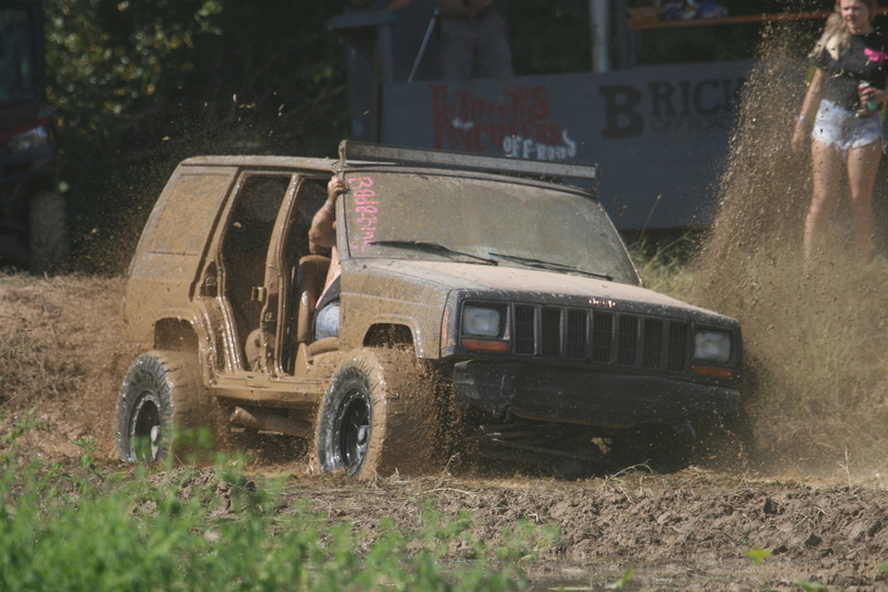 Trucks Gone Wild 2023 A -XXXXIX.jpg :: Four Wheel Drivinin' off roading at Brick's Off Road Park in Poplar Bluff, Missouri, USA. Trucks Gone Wild 2023 is one of the biggest events at the Off Road Park. The friendly park goers made sure I had a few great photographs before I left. Brad pulled up in his John Deere 4x4 that looked like it could get any vehicle un-stuck to see if everything was ok. I handed him a business card and assured him that all was well. I explained that I had been at the park with Brad Pitt and Matt Damon with my kids 20 years ago. We had fun then also I had another photo shut to get to that weekend and headed to Alton, Virginia, USA. Darren at Brick's Off Road Park in Poplar Bluff, Missouri, USA.  