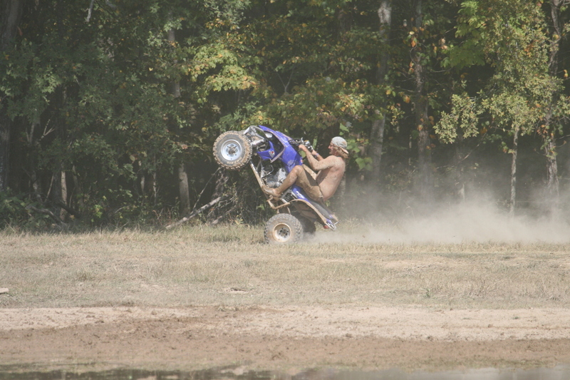 Trucks Gone Wild 2023 A -XXXXVI.jpg :: Four Wheel Drivinin' off roading at Brick's Off Road Park in Poplar Bluff, Missouri, USA. Trucks Gone Wild 2023 is one of the biggest events at the Off Road Park. The friendly park goers made sure I had a few great photographs before I left. Brad pulled up in his John Deere 4x4 that looked like it could get any vehicle un-stuck to see if everything was ok. I handed him a business card and assured him that all was well. I explained that I had been at the park with Brad Pitt and Matt Damon with my kids 20 years ago. We had fun then also I had another photo shut to get to that weekend and headed to Alton, Virginia, USA. Darren at Brick's Off Road Park in Poplar Bluff, Missouri, USA.  