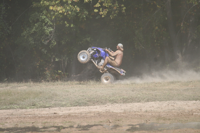 Trucks Gone Wild 2023 A -XXXXVII.jpg :: Four Wheel Drivinin' off roading at Brick's Off Road Park in Poplar Bluff, Missouri, USA. Trucks Gone Wild 2023 is one of the biggest events at the Off Road Park. The friendly park goers made sure I had a few great photographs before I left. Brad pulled up in his John Deere 4x4 that looked like it could get any vehicle un-stuck to see if everything was ok. I handed him a business card and assured him that all was well. I explained that I had been at the park with Brad Pitt and Matt Damon with my kids 20 years ago. We had fun then also I had another photo shut to get to that weekend and headed to Alton, Virginia, USA. Darren at Brick's Off Road Park in Poplar Bluff, Missouri, USA.  