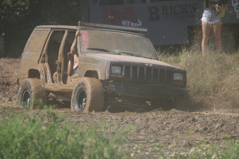 Trucks Gone Wild 2023 A -XXXXVIII.jpg :: Four Wheel Drivinin' off roading at Brick's Off Road Park in Poplar Bluff, Missouri, USA. Trucks Gone Wild 2023 is one of the biggest events at the Off Road Park. The friendly park goers made sure I had a few great photographs before I left. Brad pulled up in his John Deere 4x4 that looked like it could get any vehicle un-stuck to see if everything was ok. I handed him a business card and assured him that all was well. I explained that I had been at the park with Brad Pitt and Matt Damon with my kids 20 years ago. We had fun then also I had another photo shut to get to that weekend and headed to Alton, Virginia, USA. Darren at Brick's Off Road Park in Poplar Bluff, Missouri, USA.  