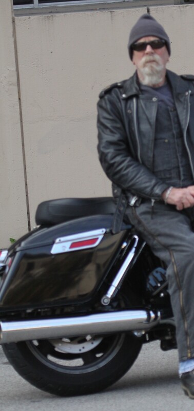 Veterans day Guy sitting on Harley 2025.jpg