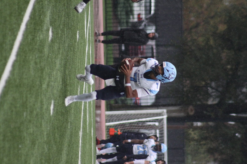 Wash U Football vs Elmhurst University 2025 IX.jpg :: Wash U (Bears) vs Elmhurst University (Bluejays) football on October 18th 2025, at Francis Olympic Field in St. Louis, Missouri, USA. It was a very rainy Saturday afternoon in the Greater St. Louis area. The game was delayed two and half hours due to weather before the teams were able to complete a quarter and half before stoppage in the second quarter. The game was played to the halftime break. This is when the game could be called a complete game. It never really stopped raining from noon however it was lightening that causes play stoppage. NCAA, CCIW DIII