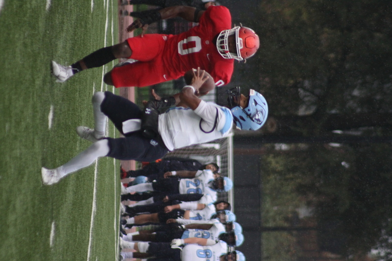 Wash U Football vs Elmhurst University 2025 XIII.jpg :: Wash U (Bears) vs Elmhurst University (Bluejays) football on October 18th 2025, at Francis Olympic Field in St. Louis, Missouri, USA. It was a very rainy Saturday afternoon in the Greater St. Louis area. The game was delayed two and half hours due to weather before the teams were able to complete a quarter and half before stoppage in the second quarter. The game was played to the halftime break. This is when the game could be called a complete game. It never really stopped raining from noon however it was lightening that causes play stoppage. NCAA, CCIW DIII