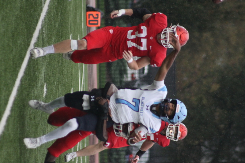 Wash U Football vs Elmhurst University 2025 XVII.jpg :: Wash U (Bears) vs Elmhurst University (Bluejays) football on October 18th 2025, at Francis Olympic Field in St. Louis, Missouri, USA. It was a very rainy Saturday afternoon in the Greater St. Louis area. The game was delayed two and half hours due to weather before the teams were able to complete a quarter and half before stoppage in the second quarter. The game was played to the halftime break. This is when the game could be called a complete game. It never really stopped raining from noon however it was lightening that causes play stoppage. NCAA, CCIW DIII