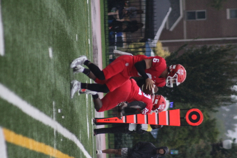 Wash U Football vs Elmhurst University 2025 XXIV.jpg :: Wash U (Bears) vs Elmhurst University (Bluejays) football on October 18th 2025, at Francis Olympic Field in St. Louis, Missouri, USA. It was a very rainy Saturday afternoon in the Greater St. Louis area. The game was delayed two and half hours due to weather before the teams were able to complete a quarter and half before stoppage in the second quarter. The game was played to the halftime break. This is when the game could be called a complete game. It never really stopped raining from noon however it was lightening that causes play stoppage. NCAA, CCIW DIII