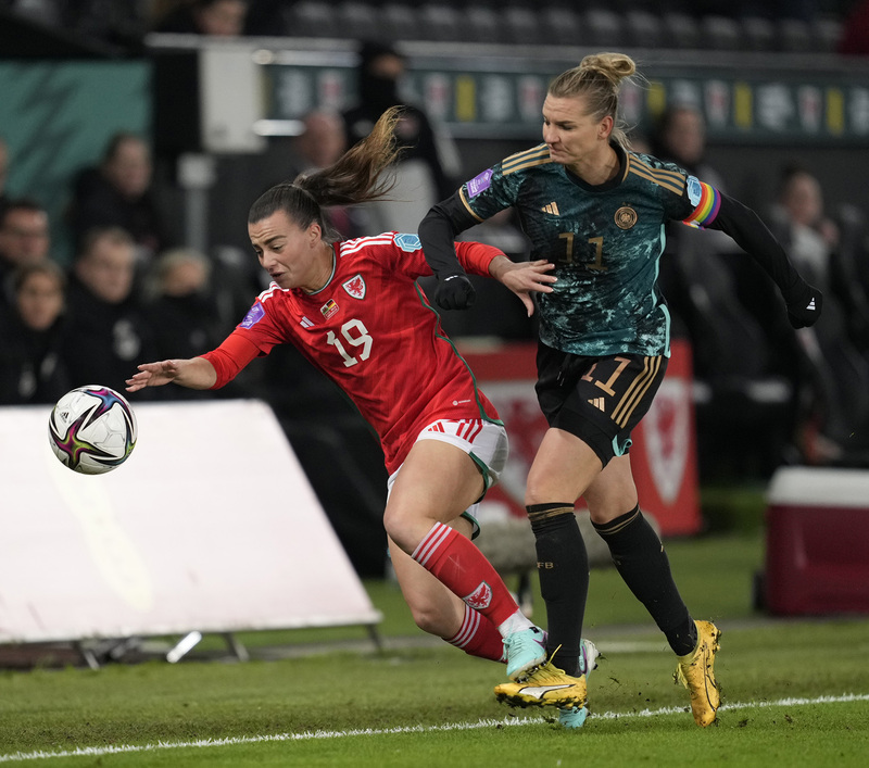 _SA13595(1).jpg :: Swansea,UK,  05 Dec 2023  Ella Powell (Wales) (L) is held by Alexandra Popp (Germany) during the UEFA Women's Nations League 2025
Wales v Germany at Swansea Stadium Swansea United Kingdom on December 05 2023 Graham Glendinning / Alamy Live News
Final Score:  0-0