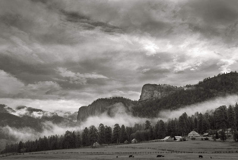 Bootjack Mountain Ranchland.jpg :: We were in Colorado for a short vacation.  I had seen this ranch many times, and always thought there should be a photograph there, but the circumstances, lighting, weather etc had never been right.  This time everything fell into place.  A very layered sky with morning fog rising from everywhere made it exactly what I had hoped for.