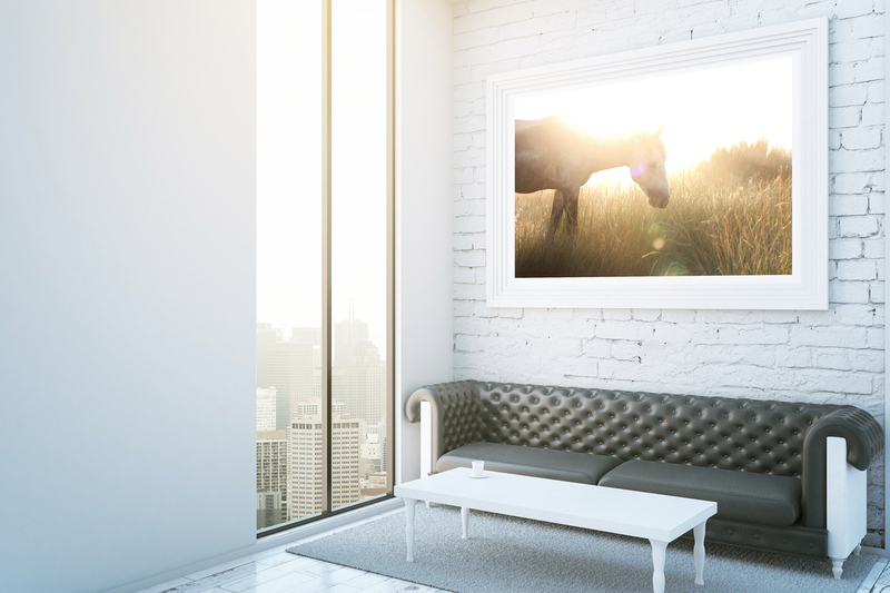 Sunstar.jpg :: Side view of luxurius white brick room with wooden floor, carpet, leather couch, coffee table, blank picture frame and city view. Mock up, 3D Rendering