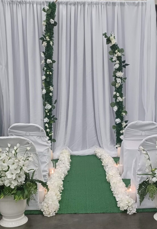 Greenery and white flower horns (ACS Bridal Expo) 20240407_115347.jpg