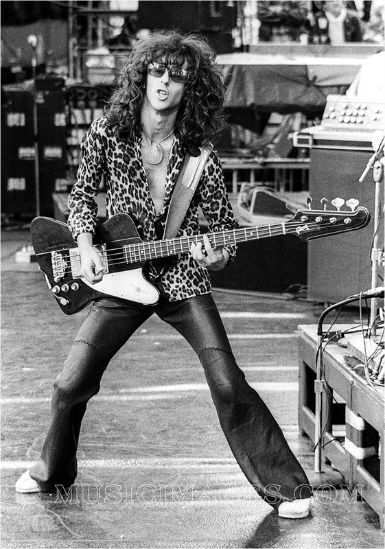 B215-9.jpg :: Kenny Aaronson performs with the Rick Derringer Band, opening for Led Zeppelin - Oakland Stadium, Oakland, Ca. 7/23/77