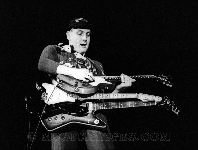 B553-3.jpg :: Rick Nielsen - Oakland Coliseum, Oakland, Ca. 12/30/78