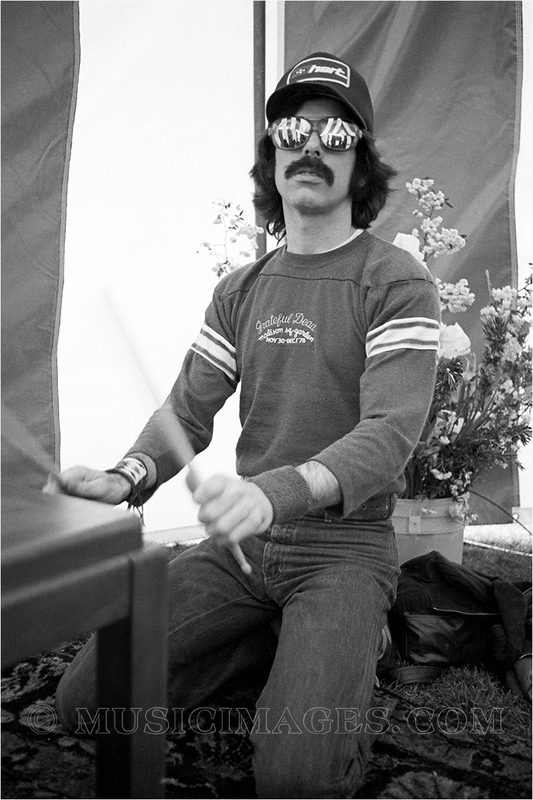 B555-35.jpg :: Warming up in the backstage tent before a show with the Grateful Dead.  Spartan Stadium, San Jose, Ca 4/22/79