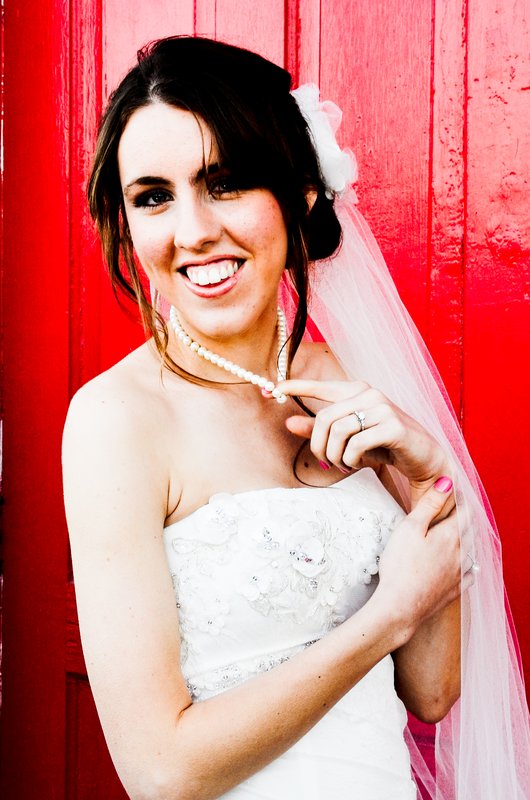 Bride at red door.jpg