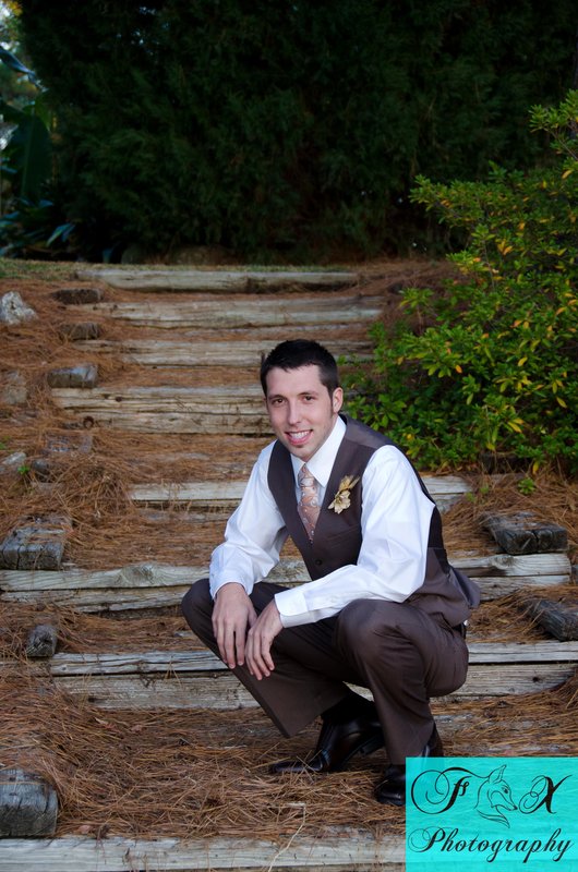 Groom outside 1.jpg :: By: Fox Photography