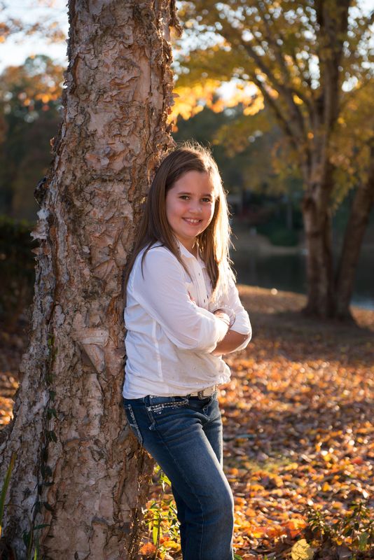 Girl outside by tree.jpg