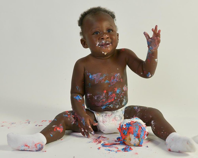 First Birthday Eating cake.jpg