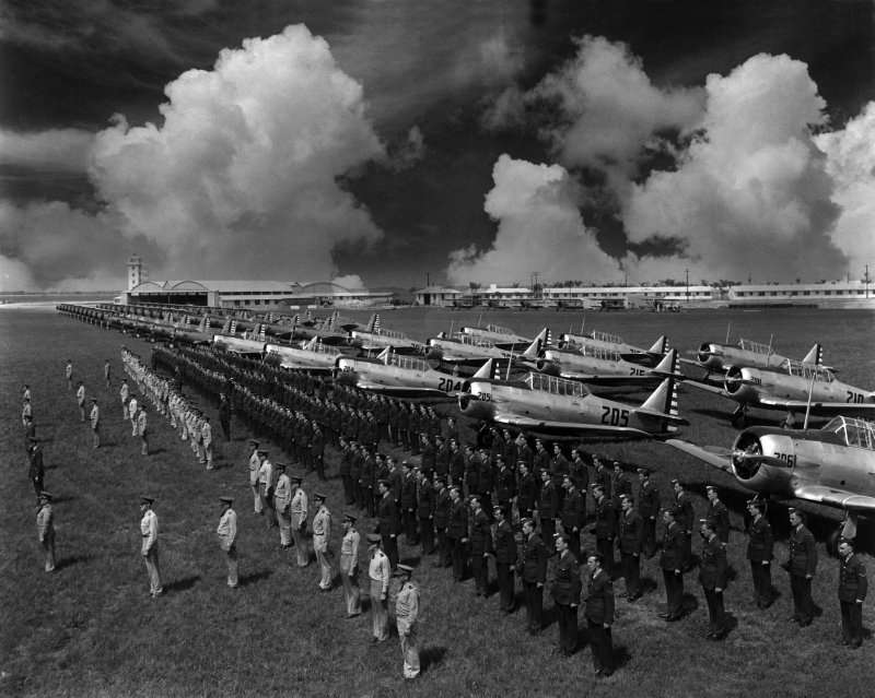 AVIATION 1-74 ERAU officers  enlisted in formation in front of planes c.jpg