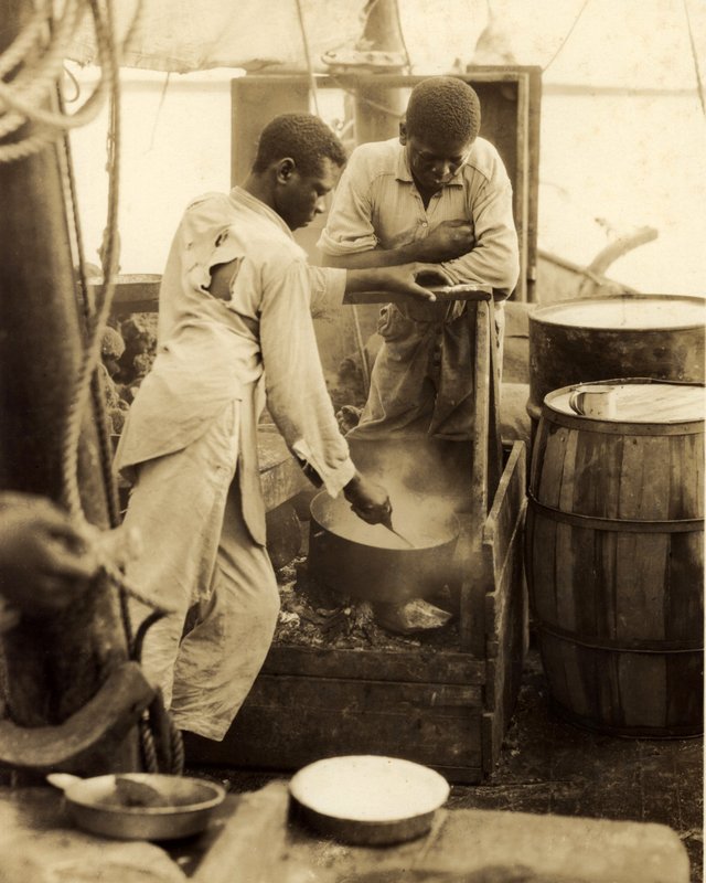MISCELLANEOUS 9-039 Nassau Bahamas two Bahamian men cooking in large pot c.jpg