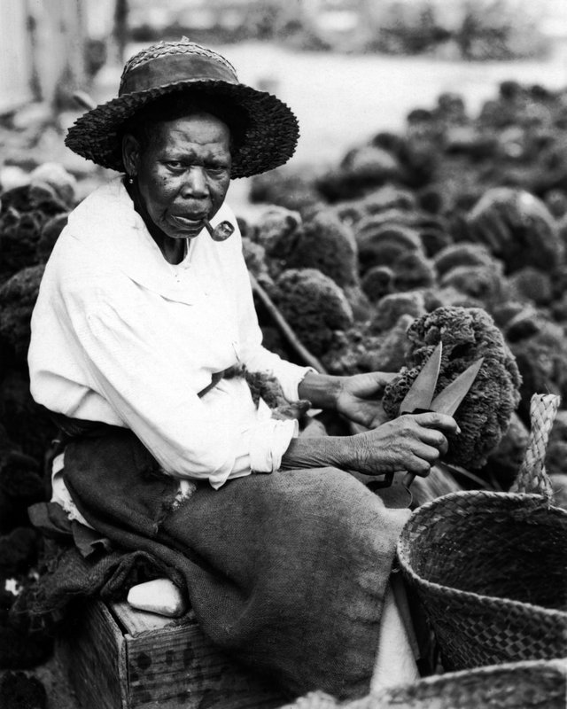 MISCELLANEOUS 9-38 Bahamian woman trimming sponges in  Nassau 1931.jpg