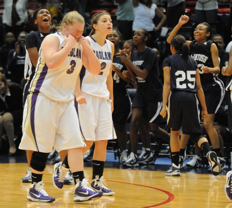 031101 1A GIRLS RAGLAND MCINTOSH.jpg :: Ragland's Allison Gann (3) and Ragland's Kailey Echols (20) react as McIntosh girls jubilate after winning 46-44 in a semi-final of the girls class 1A prep basketball state tournament at the Birmingham Jefferson Convention Complex Monday March 1, 2011 in Birmingham , Ala. (The Birmingham News, Hal Yeager)