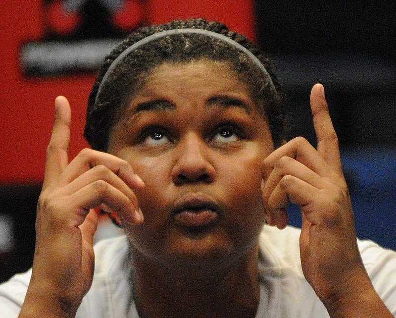 031104 4A GIRLS BREWBAKER TECH MIDFIELD.jpg :: Brewbaker Tech's Marques Webb (52) looks skyward after they defeated Midfield 59-39 in the final of the girls class 4A prep basketball state tournament at the Birmingham Jefferson Convention Complex Friday March 4, 2011 in Birmingham , Ala. ( The Birmingham News, Hal Yeager)