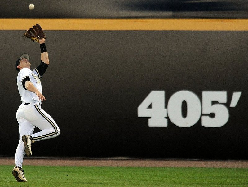 051125  SEC BASEBALL TOURNAMENT_001.jpg :: Vanderbilt's center fielder Connor Harrell (20) catches a long fly ball for an out in the SEC baseball tournament at Region's Park Wednesday May 25, 2011 in Hoover, Ala. (The Birmingham News, Hal Yeager)