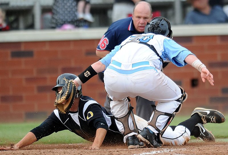 51112 OXFORD SPAIN PARK.jpg :: Oxford's Joe McGuire is safe at home past Spain Park's Grant Vetito in a state regional playoff game at Spain Park high school Friday May 11, 2012 in Hoover, Ala. (The Birmingham News, Hal Yeager)