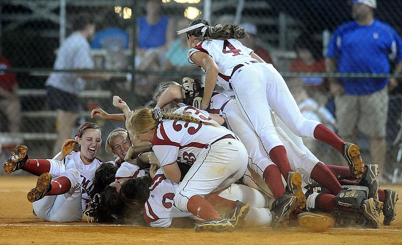 51912 CLASS 6A  SPARKMAN VESTAVIA.jpg :: ARCHIVED PHOTO- Sparkman players react at the end of their 5-4 win over Vestavia in the 6A championship game of the AHSAA State Softball Tournament at Lagoon Park Saturday May 19, 2012 in Montgomery, Ala. (The Birmingham News, Hal Yeager)