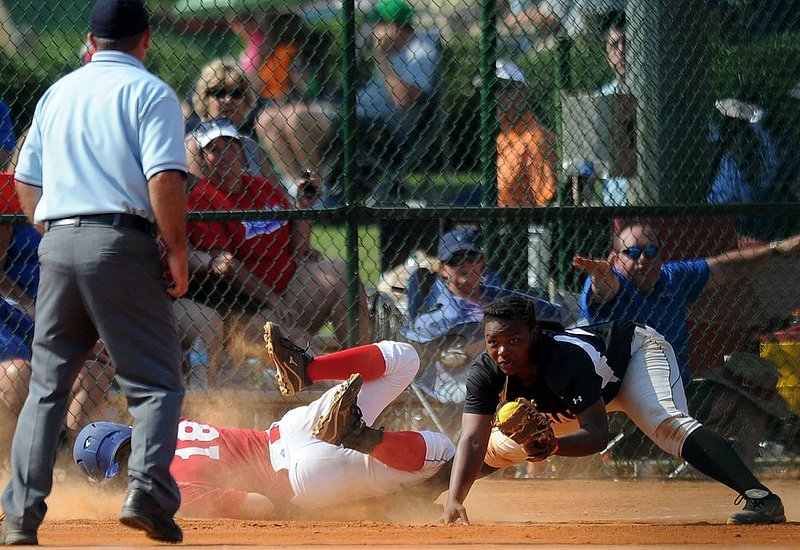 51912 CLASS 6A  VESTAVIA DOTHAN_007.jpg :: Vestavia's Sydney Cooper dives to first under  Dothan's Toni Anderson in a Class 6A game of the AHSAA State Softball Championships at Lagoon Park Saturday May 19, 2012 in Montgomery, Ala. (The Birmingham News, Hal Yeager)