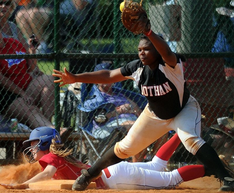 51912 CLASS 6A  VESTAVIA DOTHAN_008.jpg :: Vestavia's Sydney Cooper dives to first under  Dothan's Toni Anderson in a Class 6A game of the AHSAA State Softball Championships at Lagoon Park Saturday May 19, 2012 in Montgomery, Ala. (The Birmingham News, Hal Yeager)