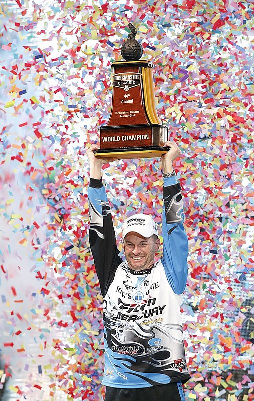 Bassmaster Classic ALHY106.jpg ::  Randy Howell, Springville, Ala., hoists the championship trophy after winning the Bassmasters Classic Sunday Feb. 23, 2014 in Birmingham, Ala.(Photo/Hal Yeager)