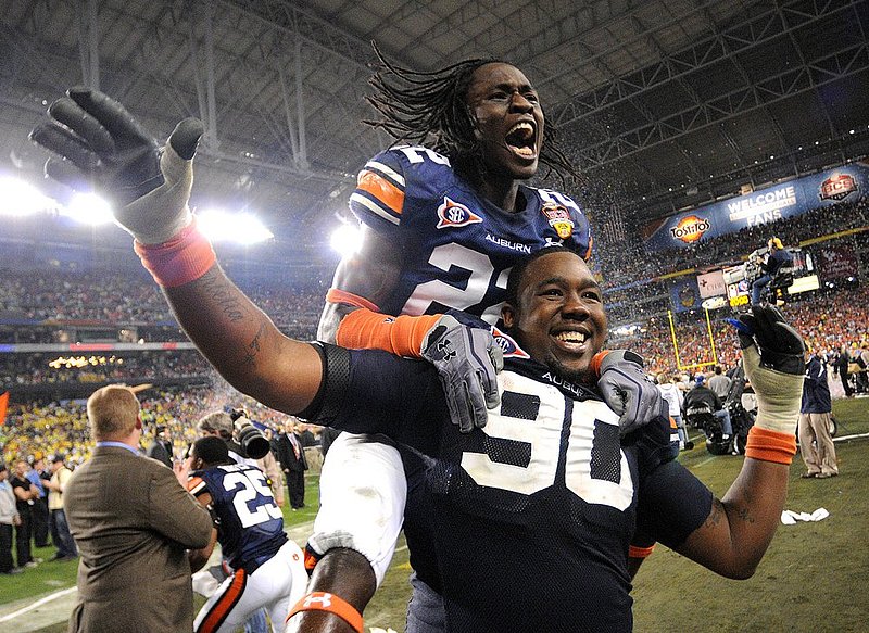 C-1AJUMP11.jpg :: Auburn defensive back T\