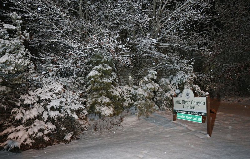 Canyon Center Snow   2.jpg :: for the second day in a row north Alabama Wednesday Feb. 12,  2014 in Fort Payne Ala.  (AP Photo/Hal Yeager)