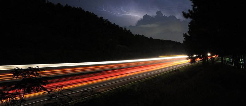 LIGHTNING   crop.jpg :: Lightning emanates from a thunderstorm over I-65 Monday August 7, 2012 near Pelham, Ala. in this 20 second time exposure. Hot, humid temperatures and spotty thunderstorms continued in their summer time pattern over central Alabama. (The Birmingham News, Hal Yeager)
