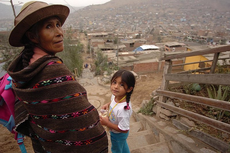 PERU_0031.jpg :: PERU-----Eight members of ClearBranch UMC, Ron and Patty Bunch, Audrey Warren and her mother Edie Smith, Bob Coburn, Paul Henderson and Hal and Teann Yeager  traveled to Lima, Peru on an week-long medical/construction mission trip. A Peruvian woman and child in the neighborhood of the clinic.  News staff/Hal Yeager  reporter/Garrison