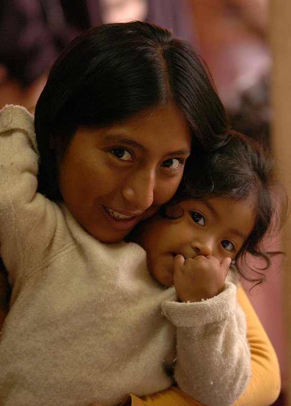 PERU_020.jpg :: PERU-----Eight members of ClearBranch UMC, Ron and Patty Bunch, Audrey Warren and her mother Edie Smith, Bob Coburn, Paul Henderson and Hal and Teann Yeager  traveled to Lima, Peru on an week-long medical/construction mission trip. A young mother and child who came to the free clinic.  News staff/Hal Yeager  reporter/Garrison
