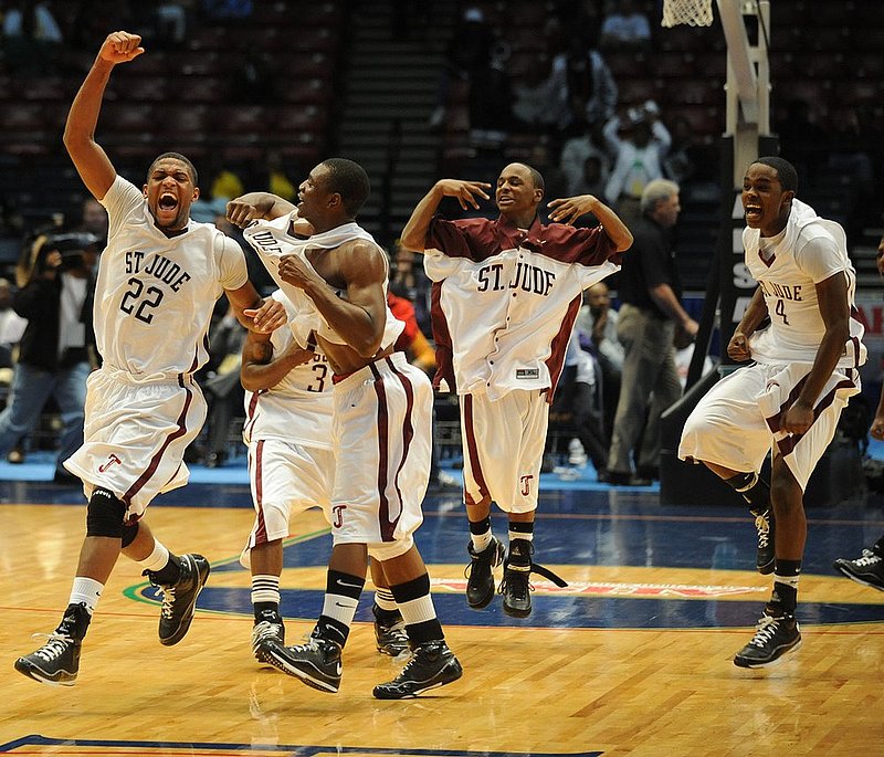 ST JUDE SULLIGENT1.jpg :: ST JUDE SULLIGENT----St Jude wins the boys class 1A state basketball championship over Sulligent 72-59. St Jude players react at the end of the game. News staff/Hal Yeager reporter/Victory