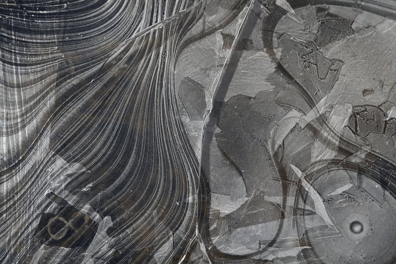 WINTER WEATHER ALHY110                               .jpg :: Ice forms swirls on the banks of the Cahaba River Thursday January 30,  2014 in Vestavia Hills,  Ala. The south woke up to more freezing temperatures but officials are hoping for a thaw and relief from the icy conditions.  (AP Photo/Hal Yeager)