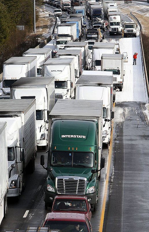 WINTER WEATHER ALHY120           .jpg :: Traffic is at a standstill on Interstate 20 westbound as officials work to clear abandoned vehicles Wednesday January 29,  2014 in Leeds,  Ala.  (AP Photo/Hal Yeager)